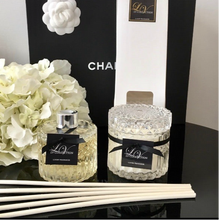 Bella glass canister candle with flat embossed lid