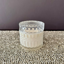Bella glass canister candle with flat embossed lid