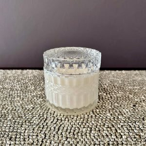 Bella glass canister candle with flat embossed lid