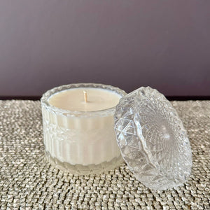 Bella glass canister candle with flat embossed lid