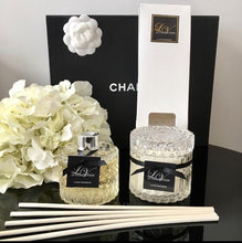 Bella glass canister candle with flat embossed lid